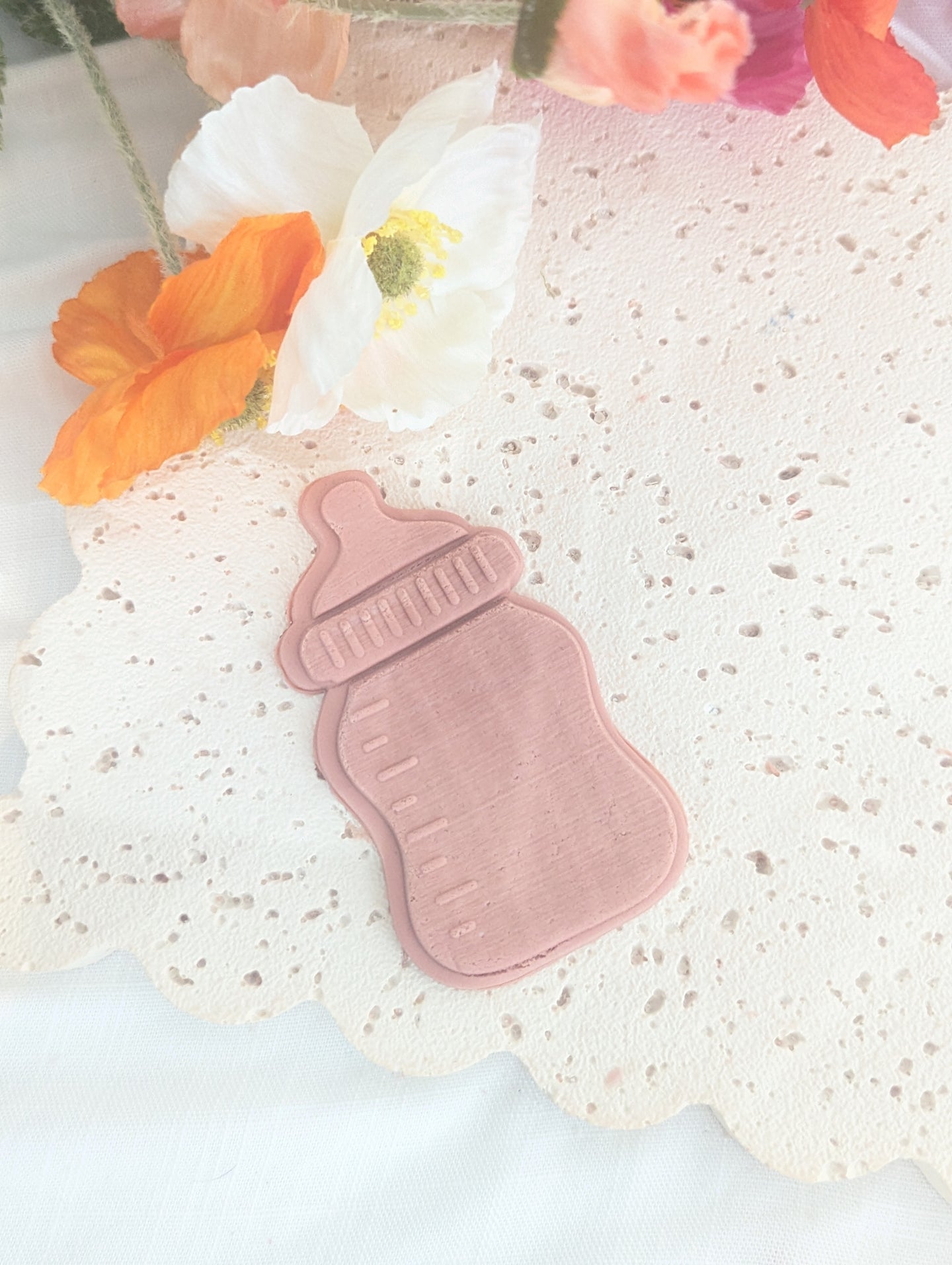 Baby Bottle Debosser and Cutter